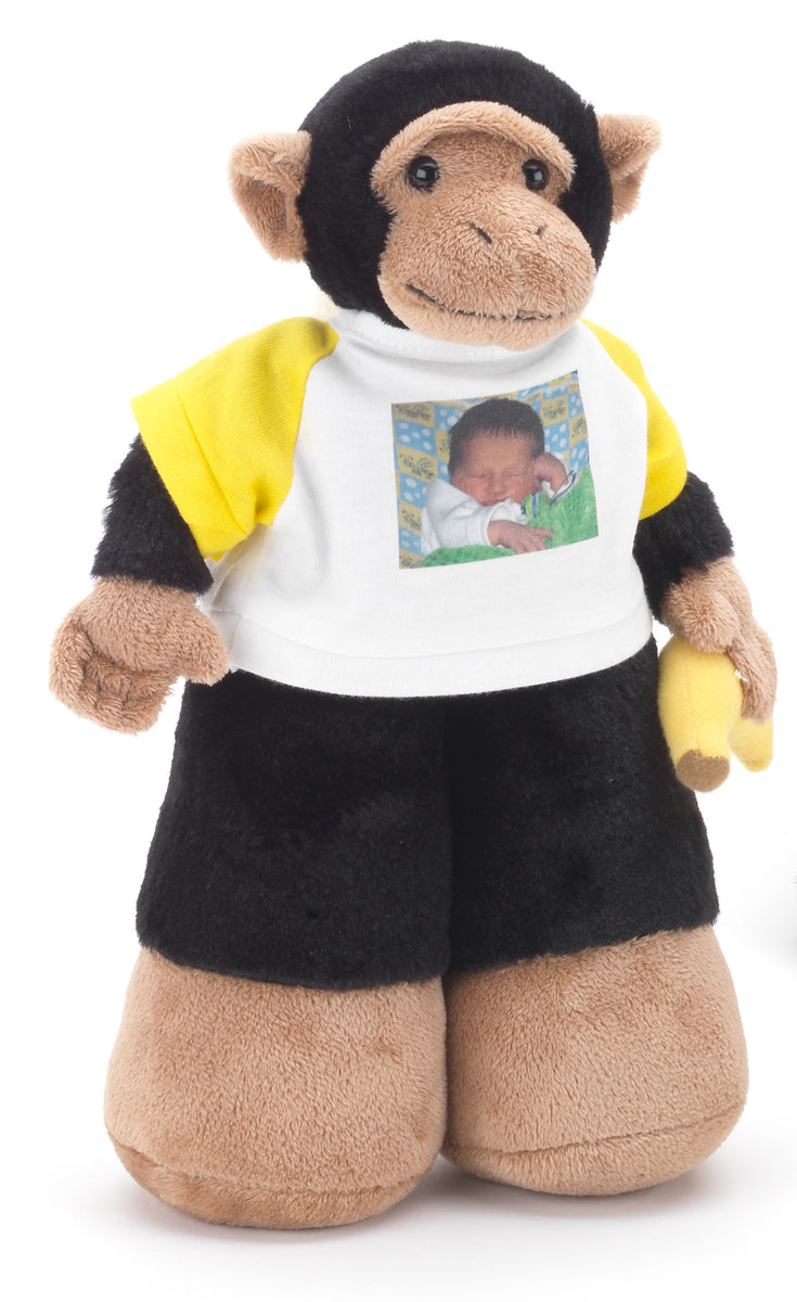 Monkey holding top banana stuffed animal